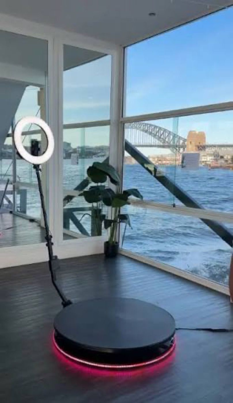 360 Photobooth platform set up with a waterfront view