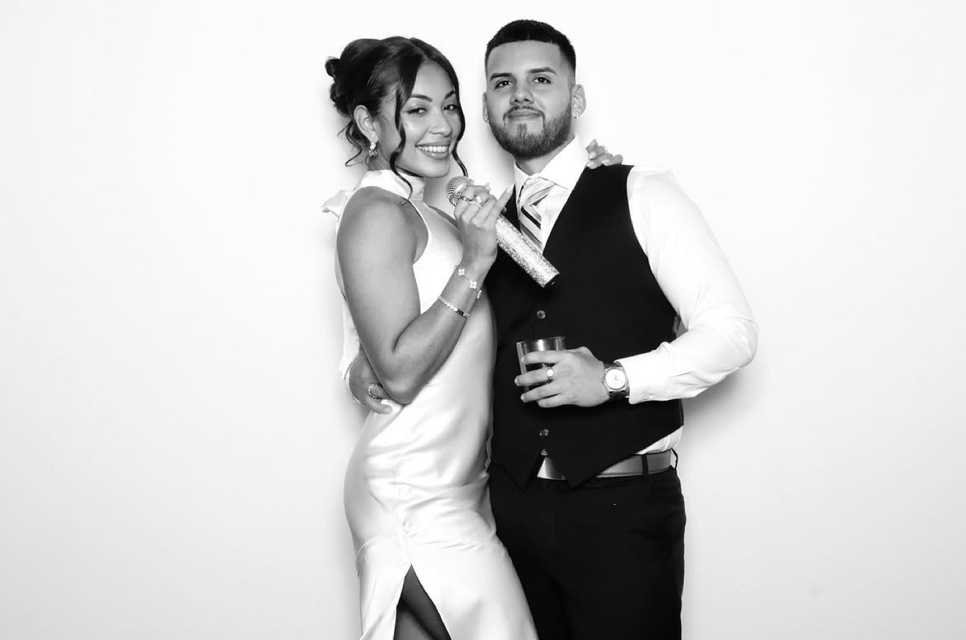 Black and white photobooth portrait of a couple