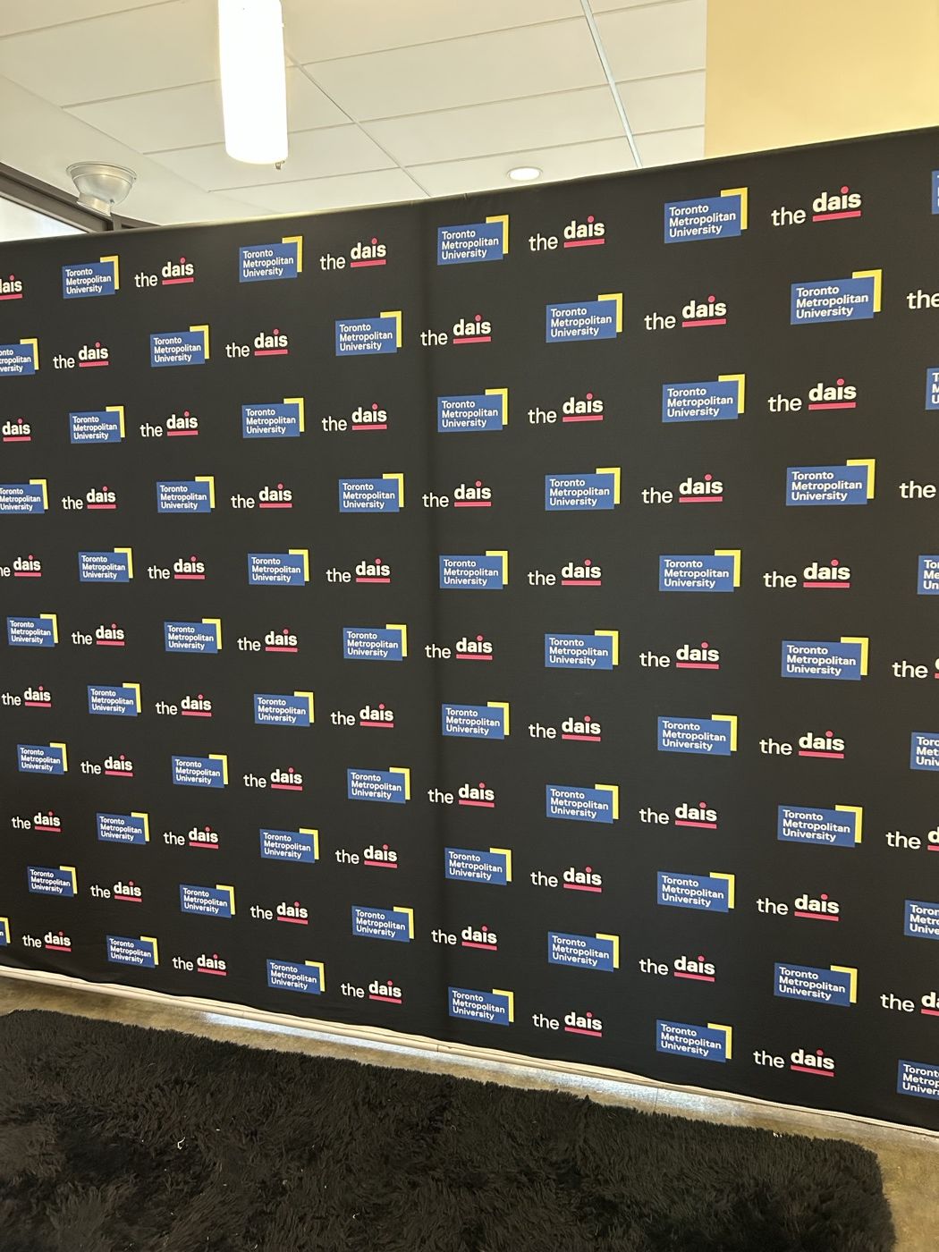 Custom branded step-and-repeat wall backdrop
