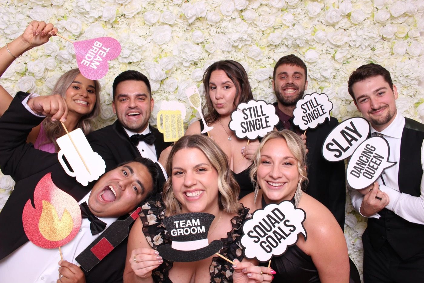 Happy guests celebrating together at a LetsClick Photobooth event